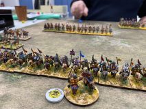 Les Caballarii Francs Carolingiens font face aux redoutables Arabes Abbassides.