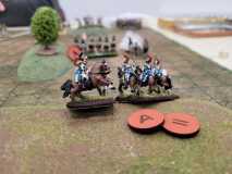 Cavaliers Français en repli sur une colline.