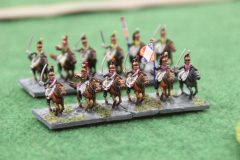 Une unités de Dragons Français avance en formation.