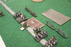 Les troupes italiennes prennent possession d'un groupe de batiments.