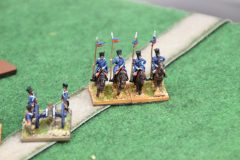Une cavalerie Prusienne soutenue par une batterie de canon.