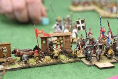 La bataille fait rage entre les Hussites et les Croisés Tardifs ! Ici, un chariot de guerre Hussite.