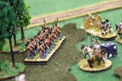 Les Autrichiens prennent position dans un bois.