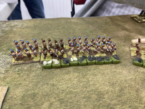 Des lanciers d'élite Incas se placent derrière des fortifications.