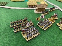 Les troupes Autrichiennes progressent vers un village.
