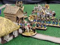 Troupes Autrichiennes progressant dans le village.