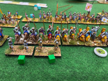 Les chevaliers Français tentent une charge sur les archers longs Bourguignons.
