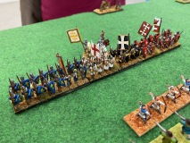 La ligne de lanciers lourds Croisés commandés par Baudouin en personne.