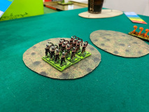 Des archers du Chaos ont pris position dans un terrain.