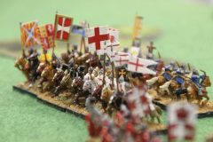 Un groupe de chevaliers Croisés Tardifs couvre la retraite de cavaleries légères.